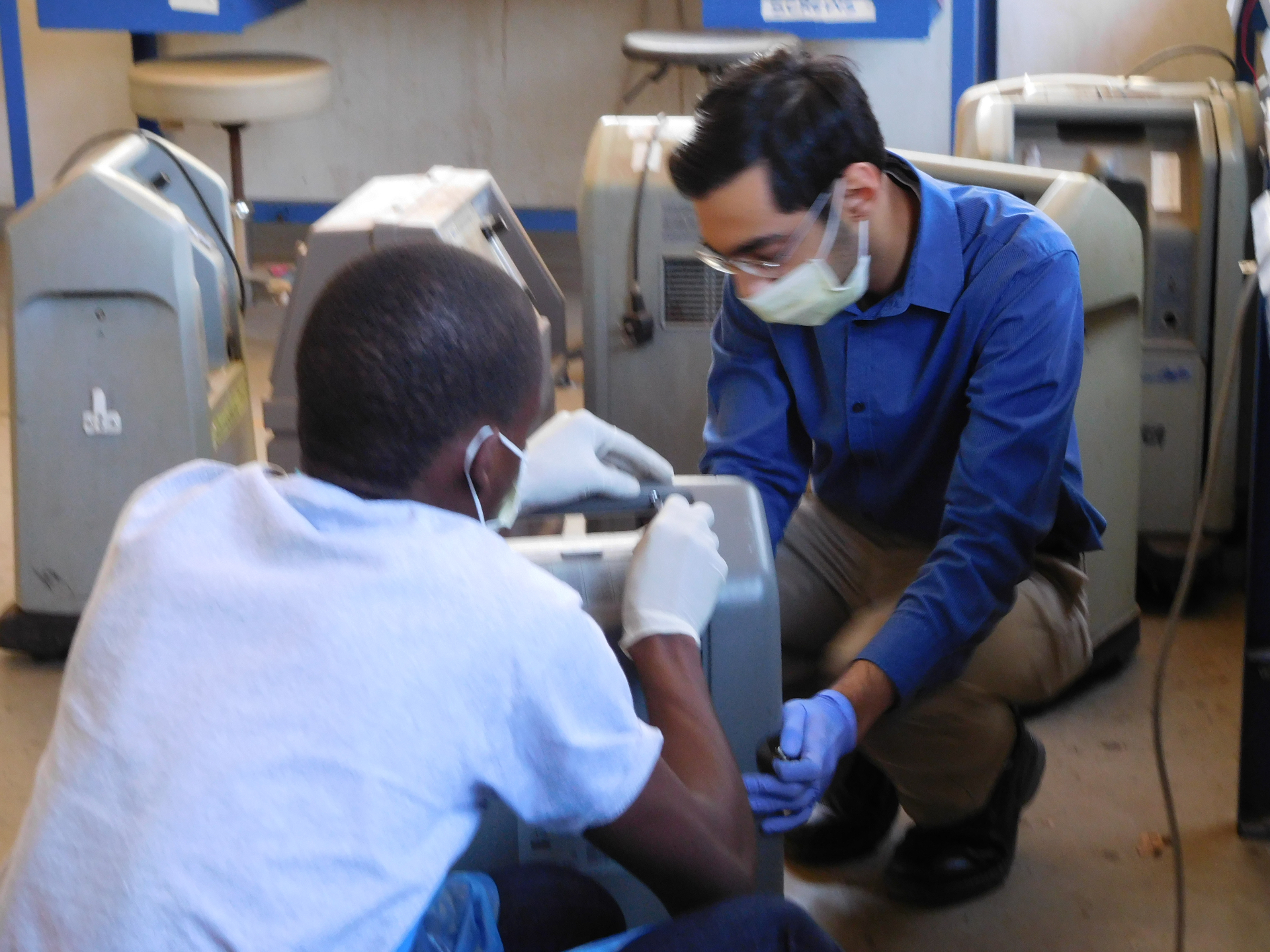 Repairing an oxygen concentrator at Kamuzu Central Hospital